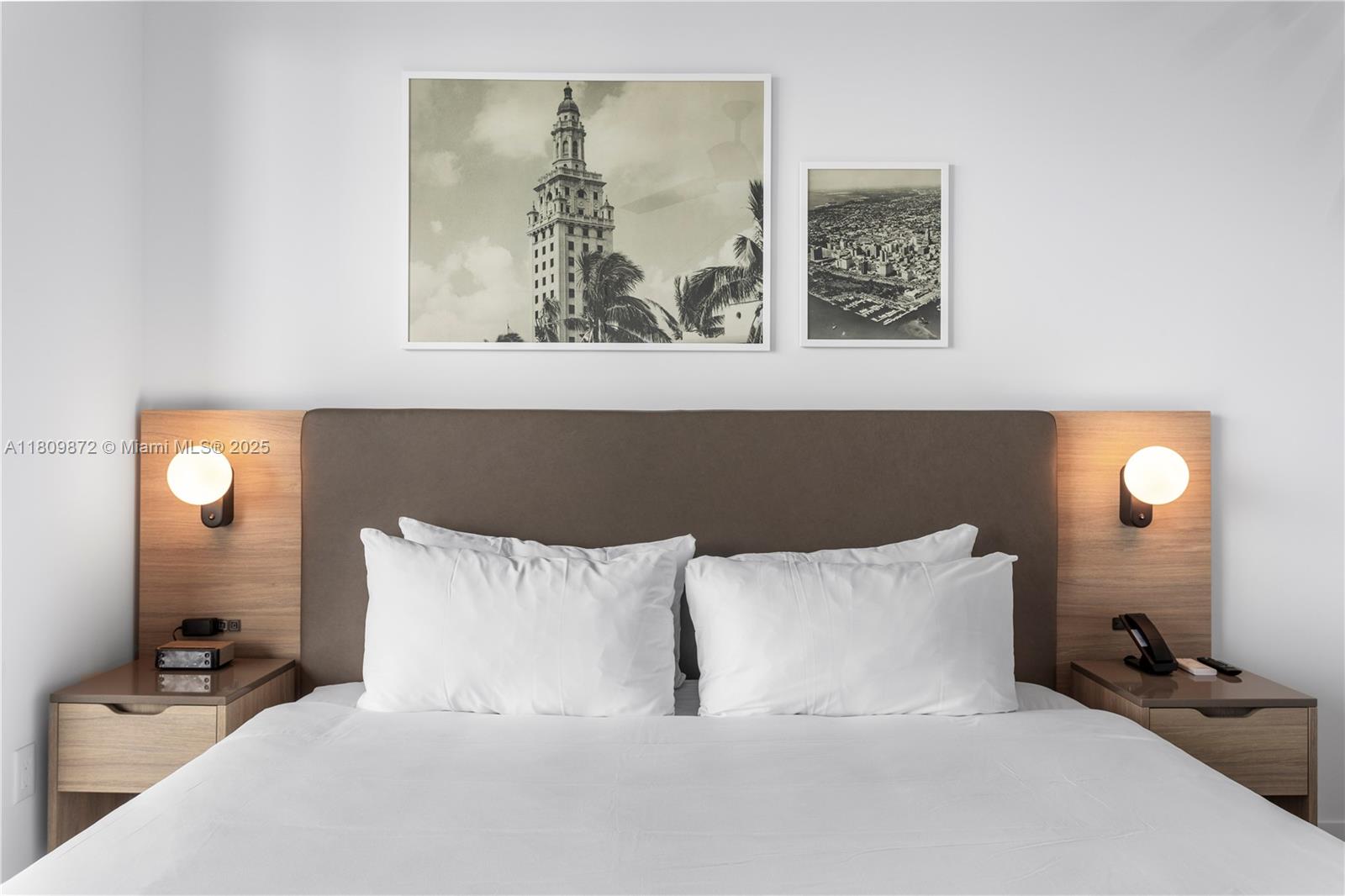 601 Northeast 1st Street, Unit 3907 Miami, FL 33132 - Photo 7 of 13 a bed room with a bed and painting on the wall