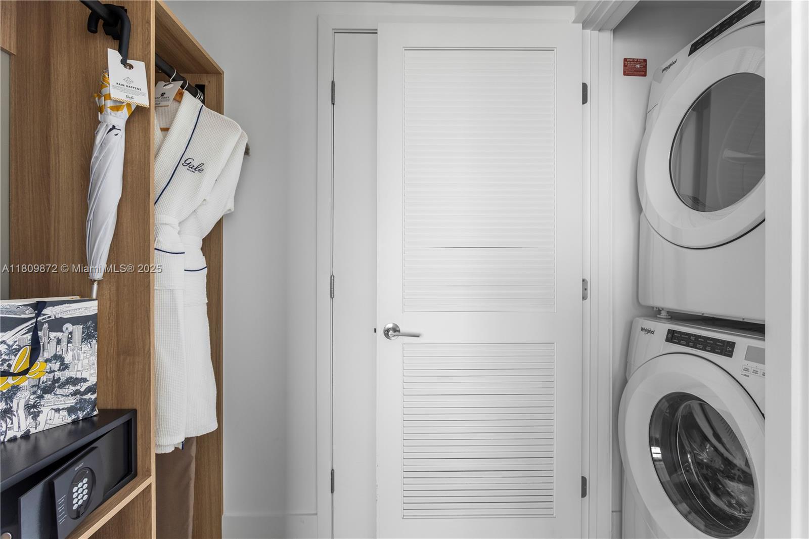 601 Northeast 1st Street, Unit 3907 Miami, FL 33132 - Photo 10 of 13 a utility room with dryer and washer