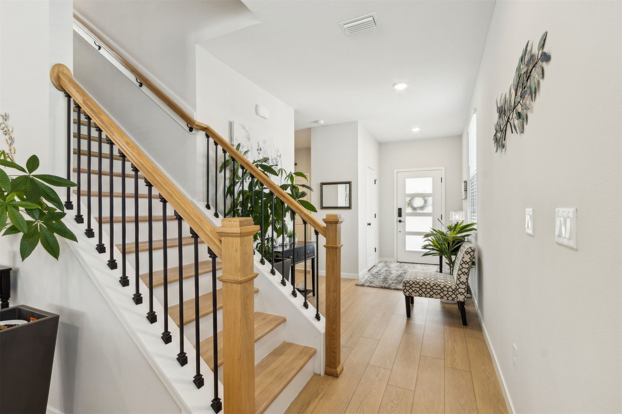 96277 Broadmoore Road Fernandina Beach, FL 32034 - Photo 12 of 26 a view of entryway with wooden floor and stairs
