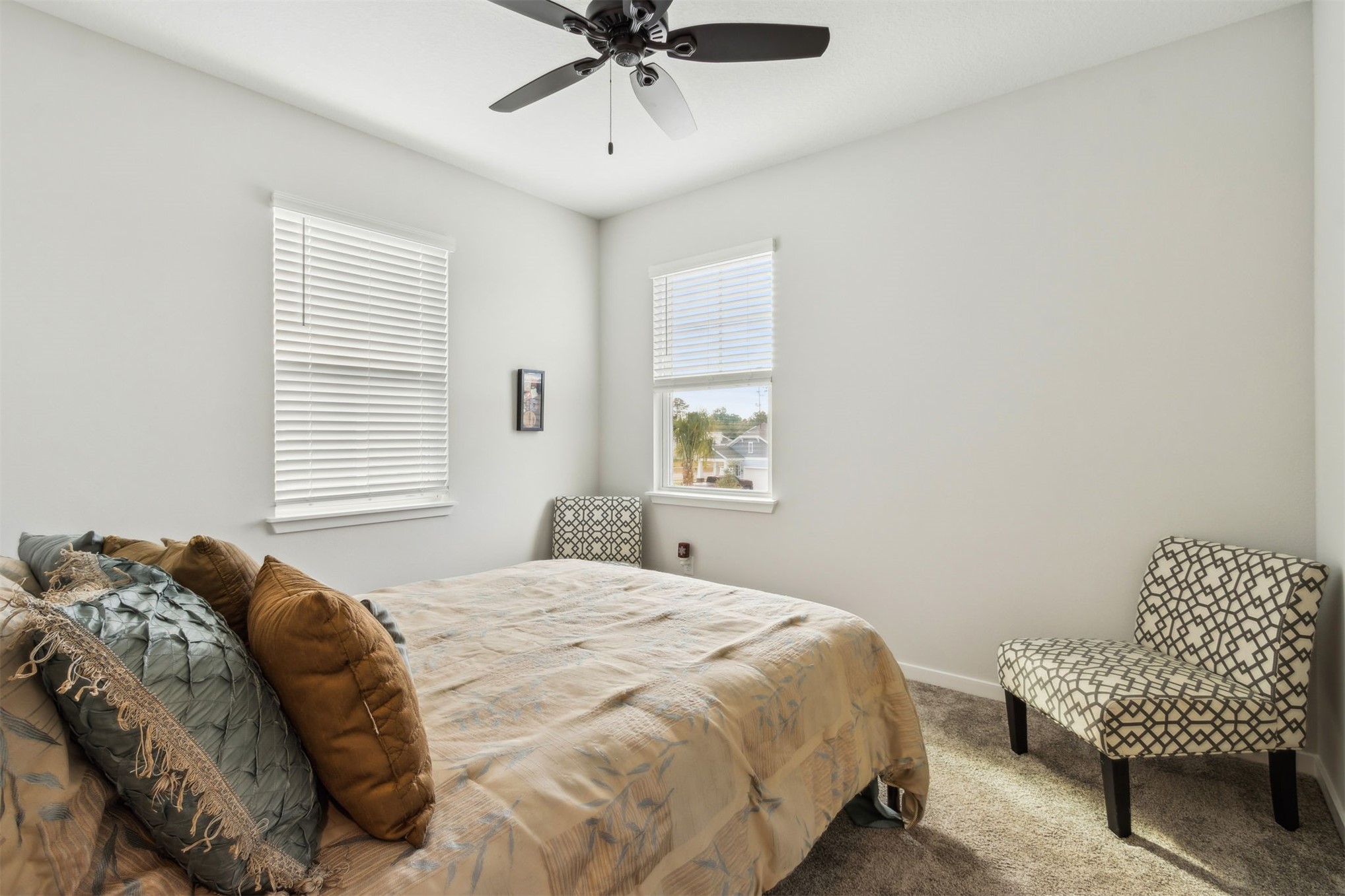 96277 Broadmoore Road Fernandina Beach, FL 32034 - Photo 18 of 26 a bedroom with a bed and window