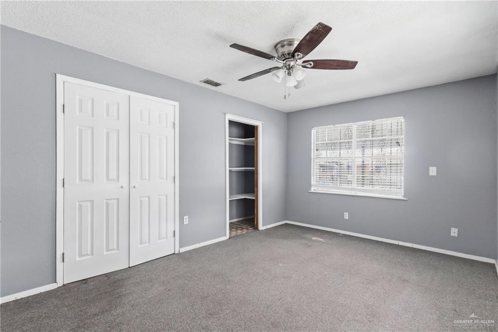 101 Ash Street Donna, TX 78537 - Photo 11 of 14 a view of an empty room with a window