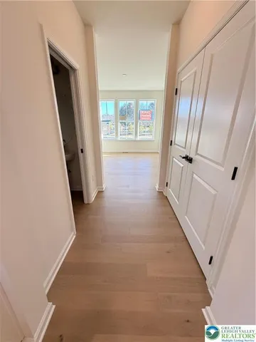 a view of hallway with windows