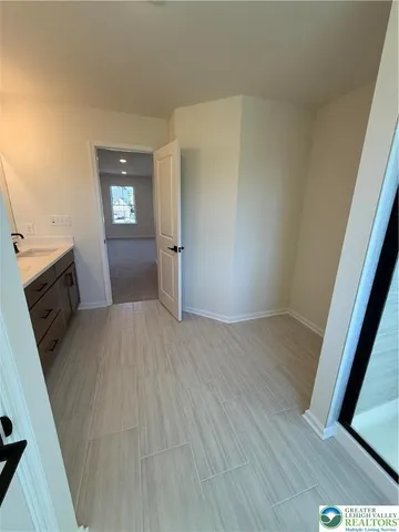 a view of a livingroom with a kitchen