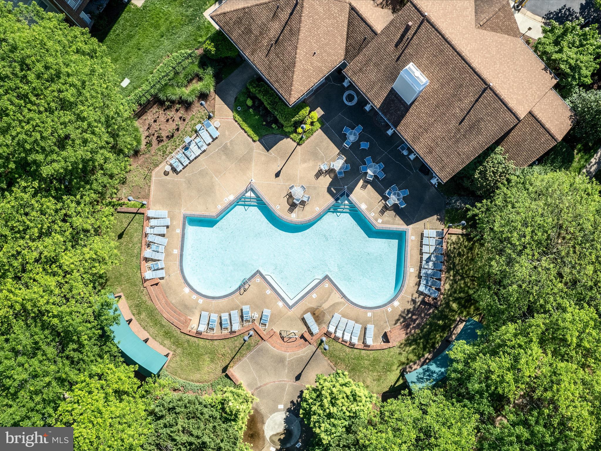21019 Timber Ridge Terrace, Unit 102 Ashburn, VA 20147 - Photo 3 of 39 Walk to the club house and the pool!