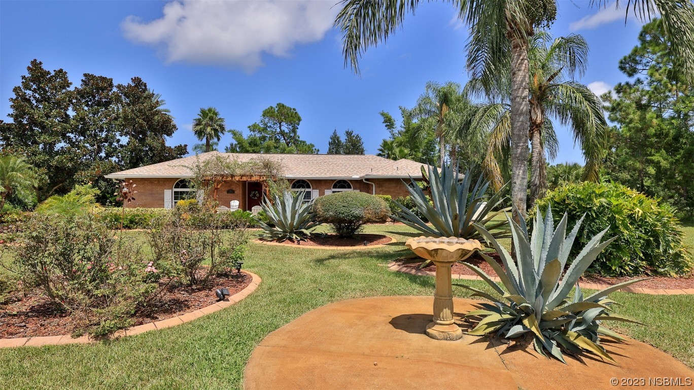 160 Packwood Road Edgewater, FL 32141 - Photo 2 of 31 a view of a house with swimming pool