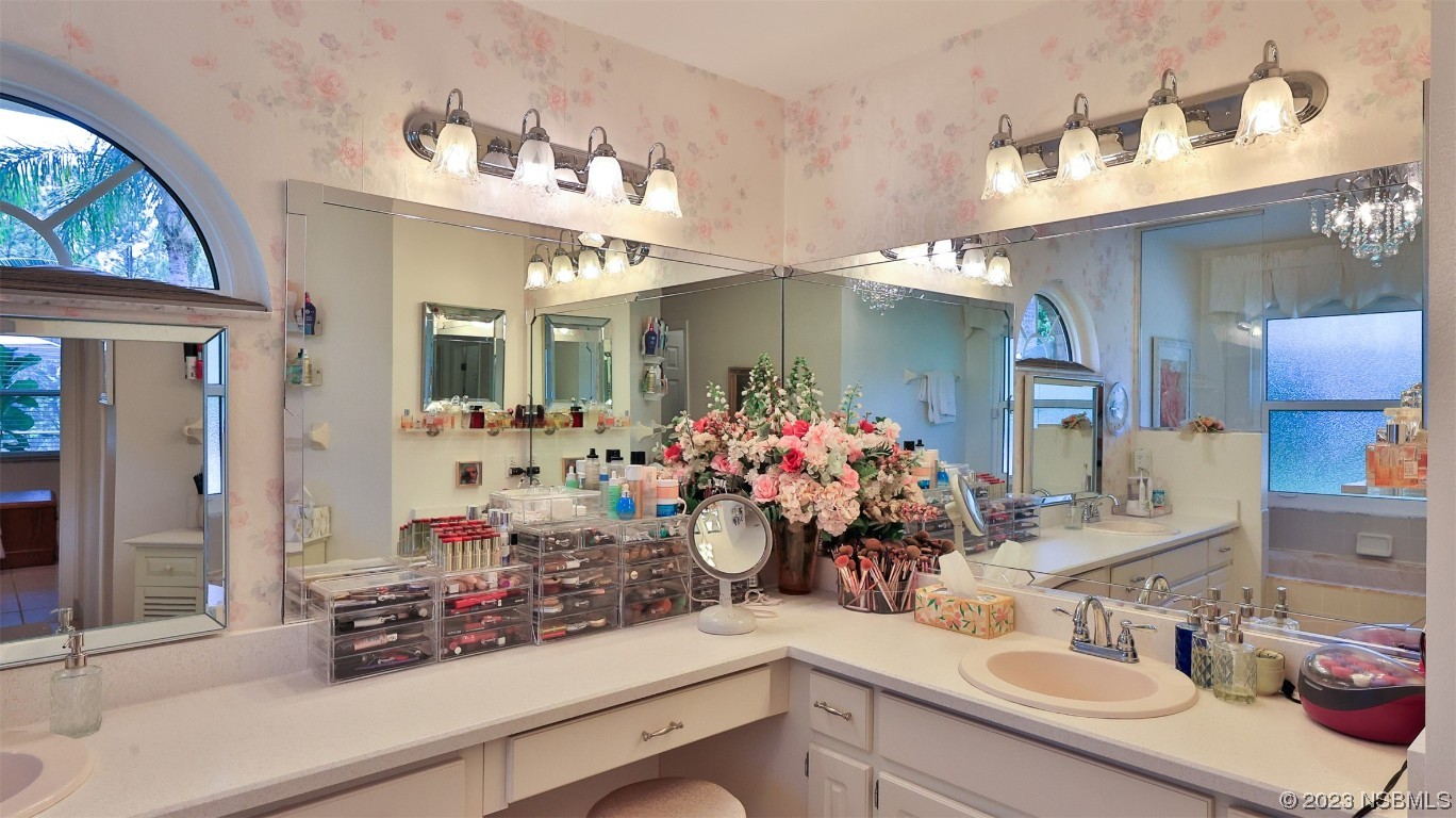 160 Packwood Road Edgewater, FL 32141 - Photo 21 of 31 a bathroom with a sink mirror and vanity