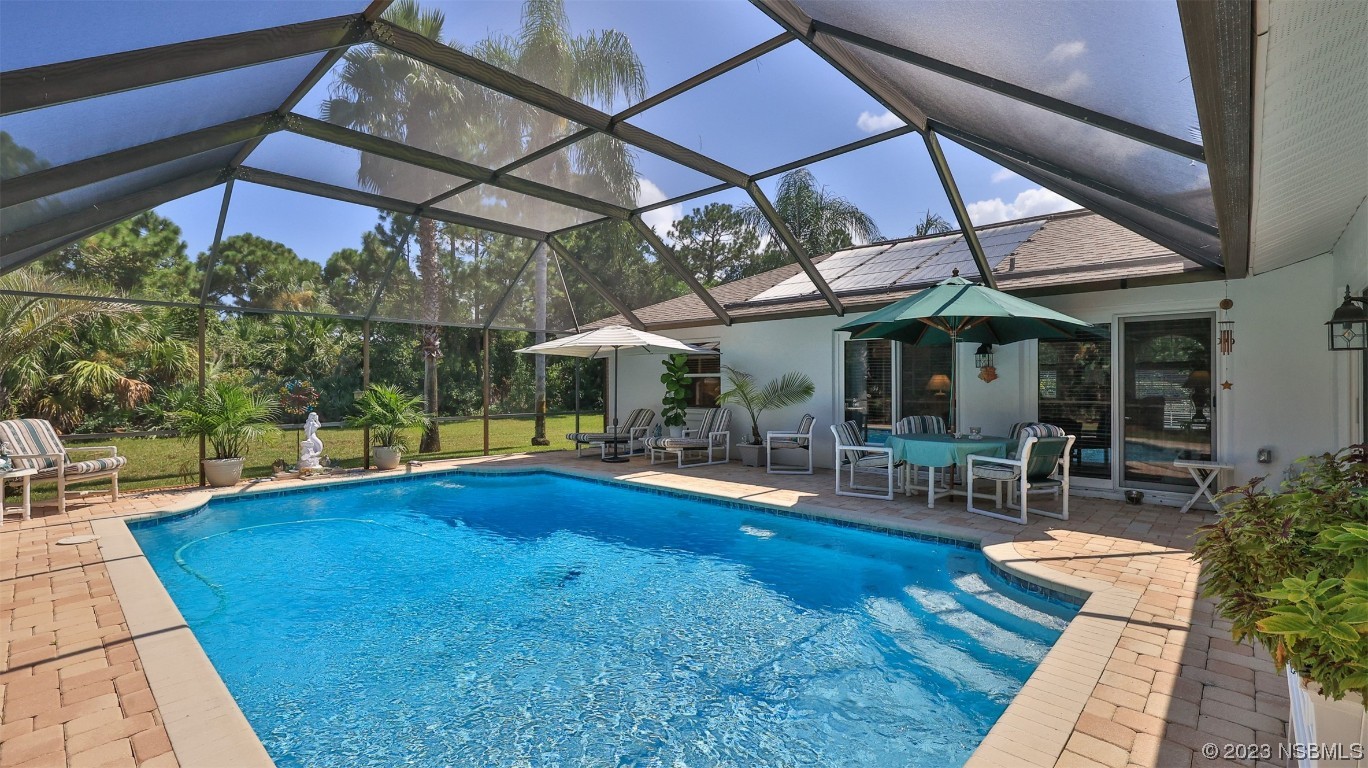 160 Packwood Road Edgewater, FL 32141 - Photo 28 of 31 a view of a swimming pool with a patio