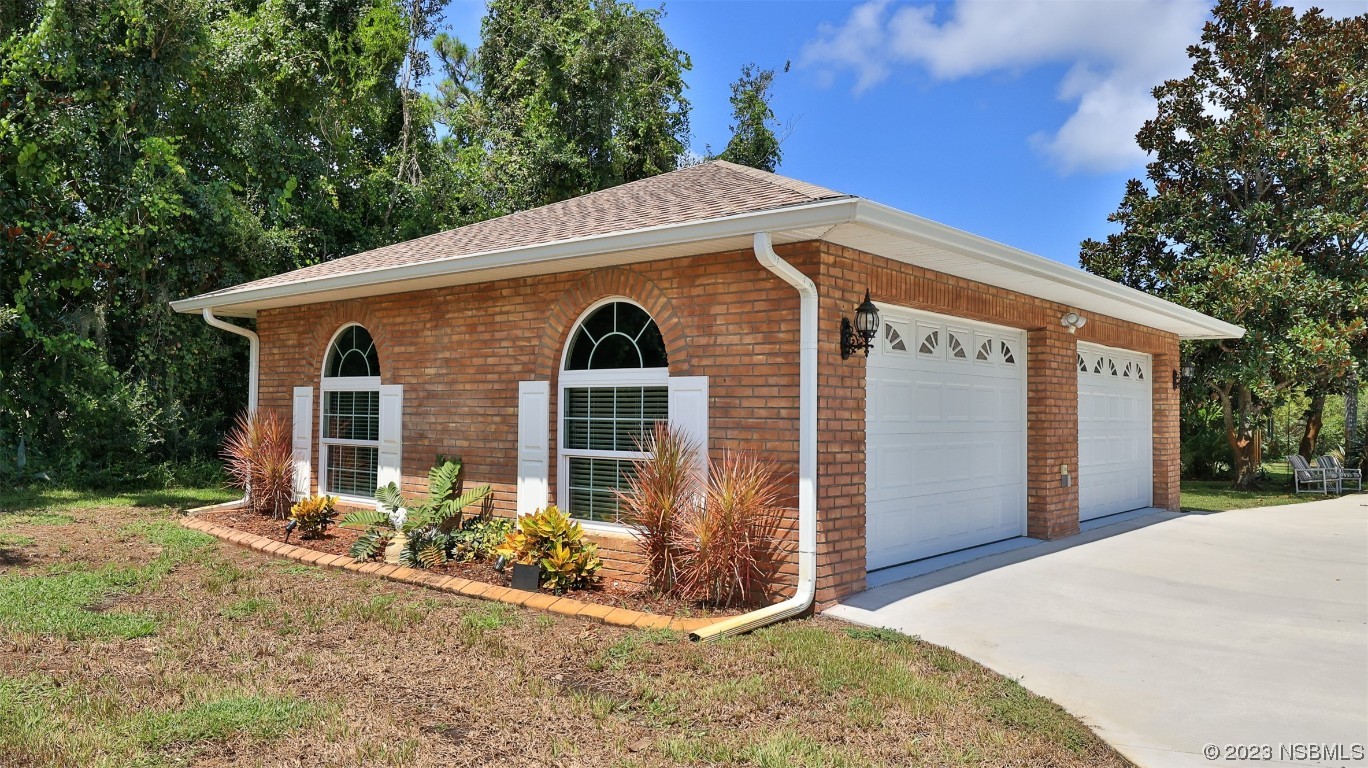 160 Packwood Road Edgewater, FL 32141 - Photo 6 of 31 a view of a house with a yard
