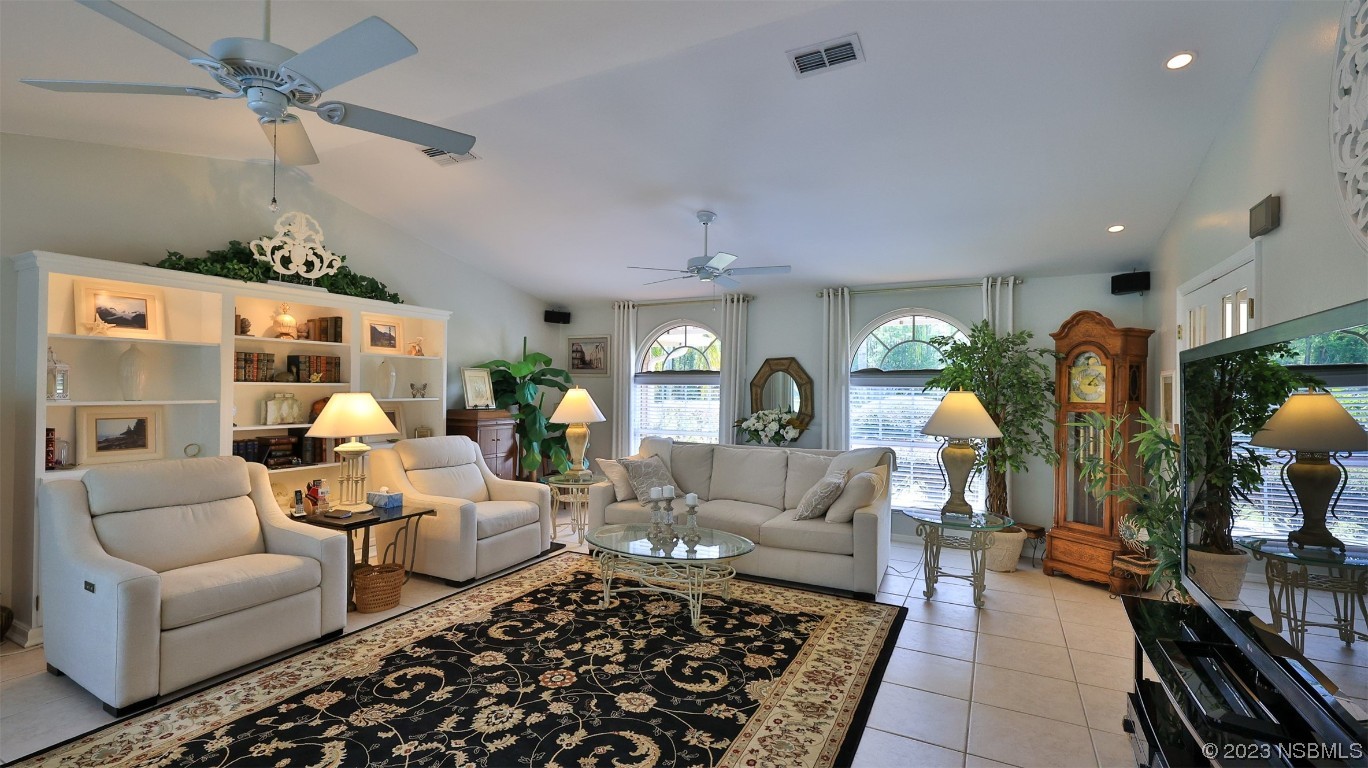 160 Packwood Road Edgewater, FL 32141 - Photo 10 of 31 a living room with furniture and a rug