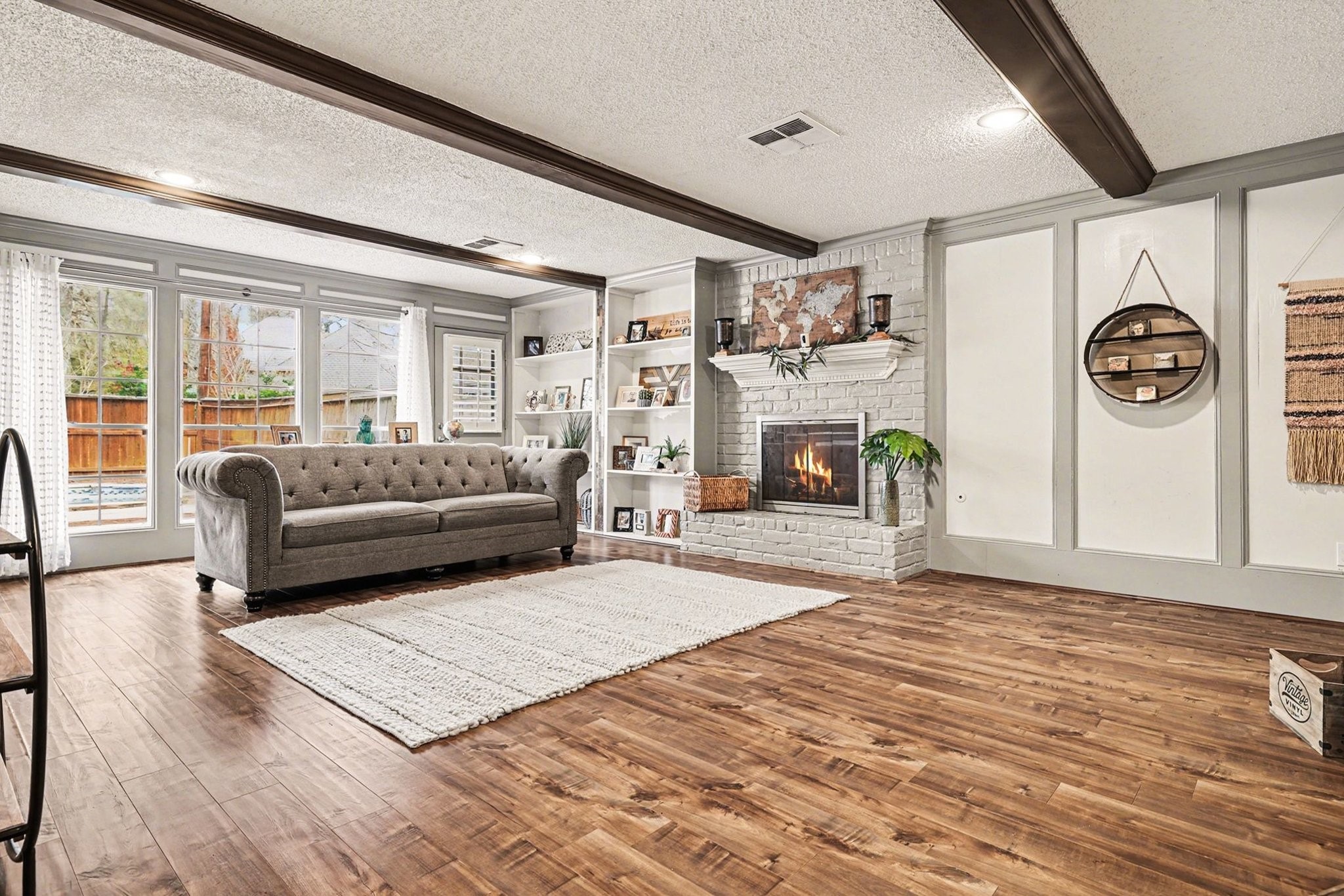 9530 Arcade Drive Spring, TX 77379 - Photo 13 of 37 This wonderful living room also has ample views and access to the backyard.