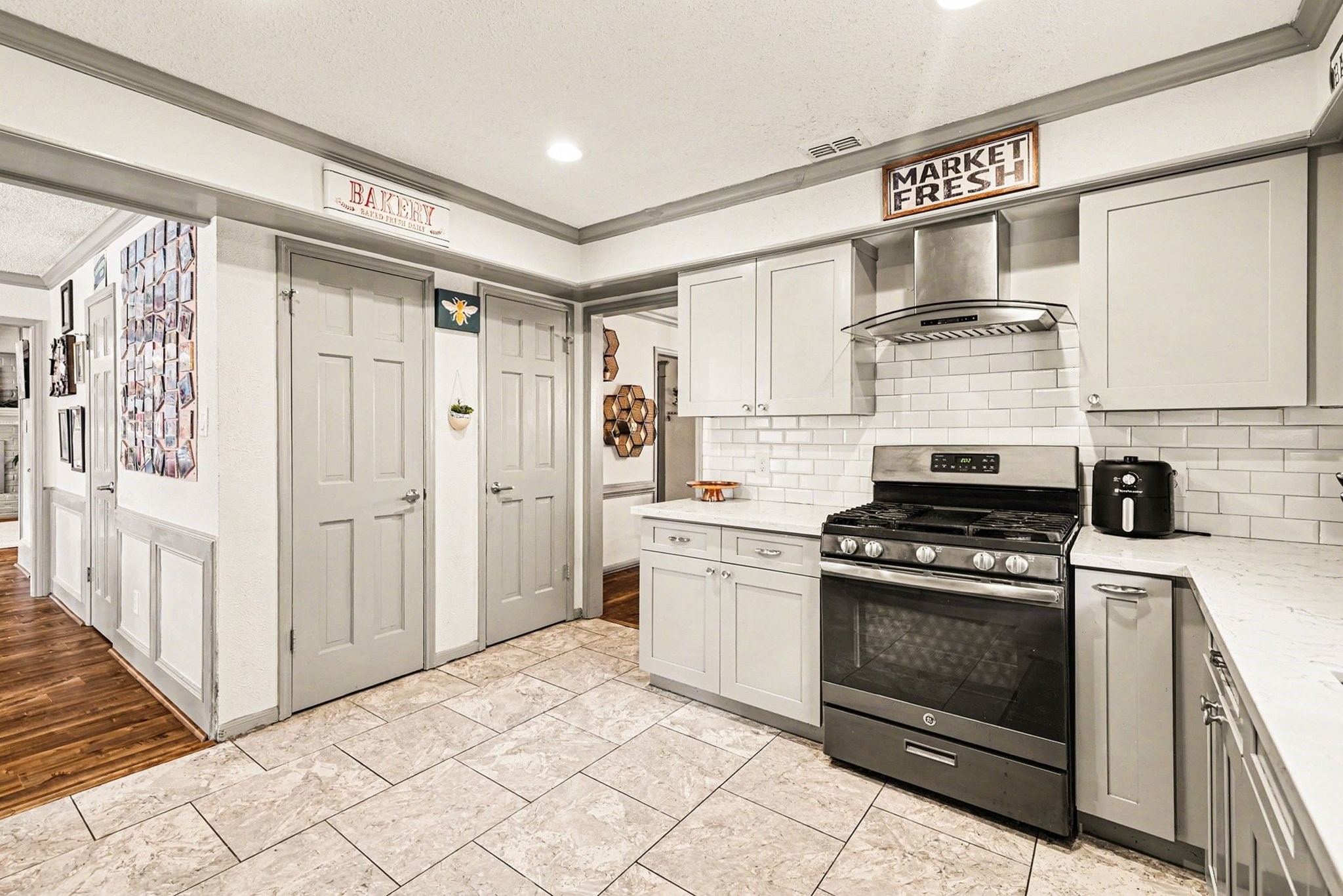 9530 Arcade Drive Spring, TX 77379 - Photo 19 of 37 This kitchen also has ample storage space in the dual pantries.
