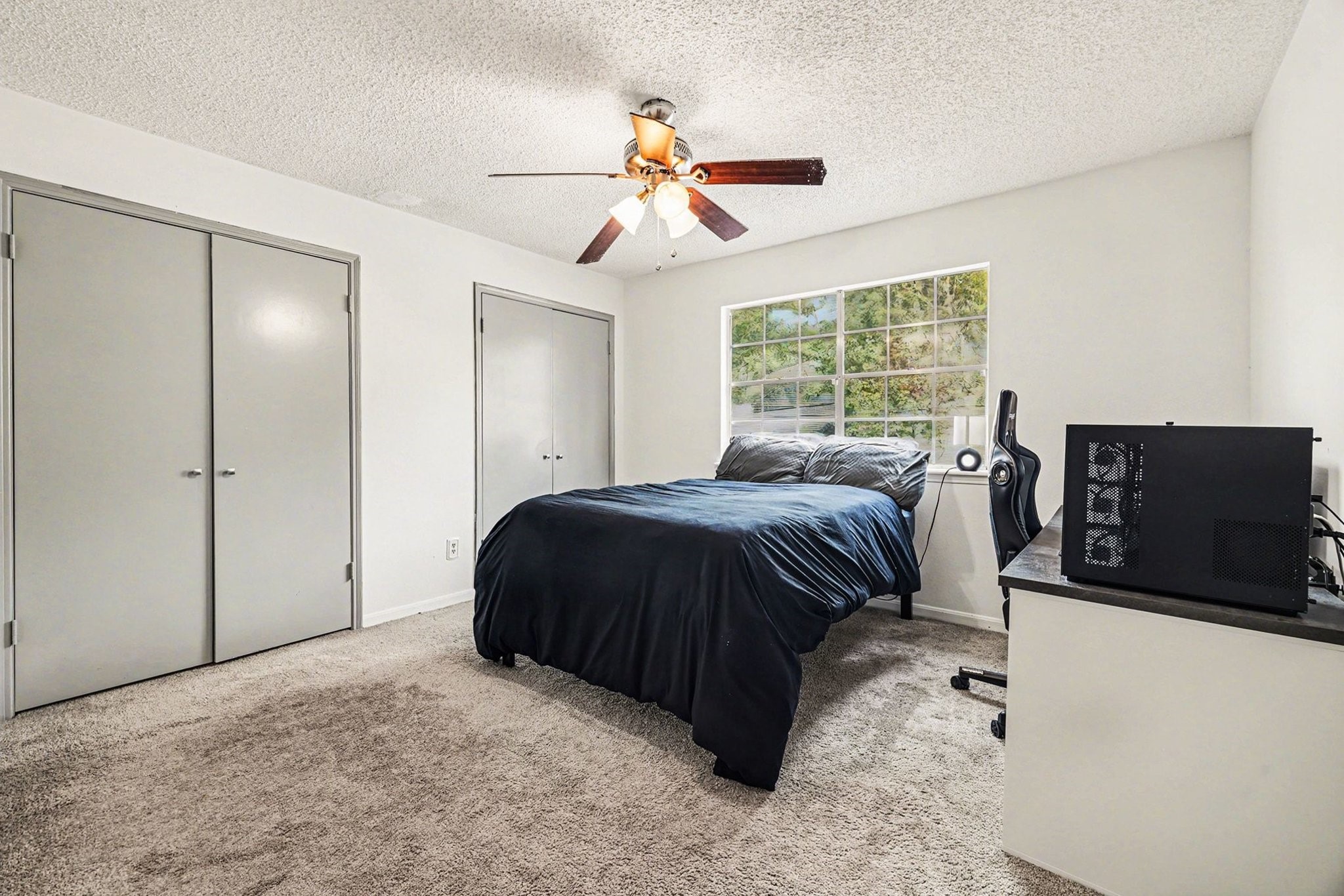 9530 Arcade Drive Spring, TX 77379 - Photo 24 of 37 Upstairs secondary bedroom with lots of closet space.