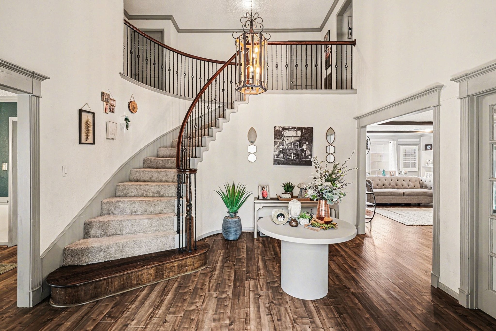 9530 Arcade Drive Spring, TX 77379 - Photo 6 of 37 Grand entry welcomes you with an elegant spiral staircase, creating a stunning first impression.