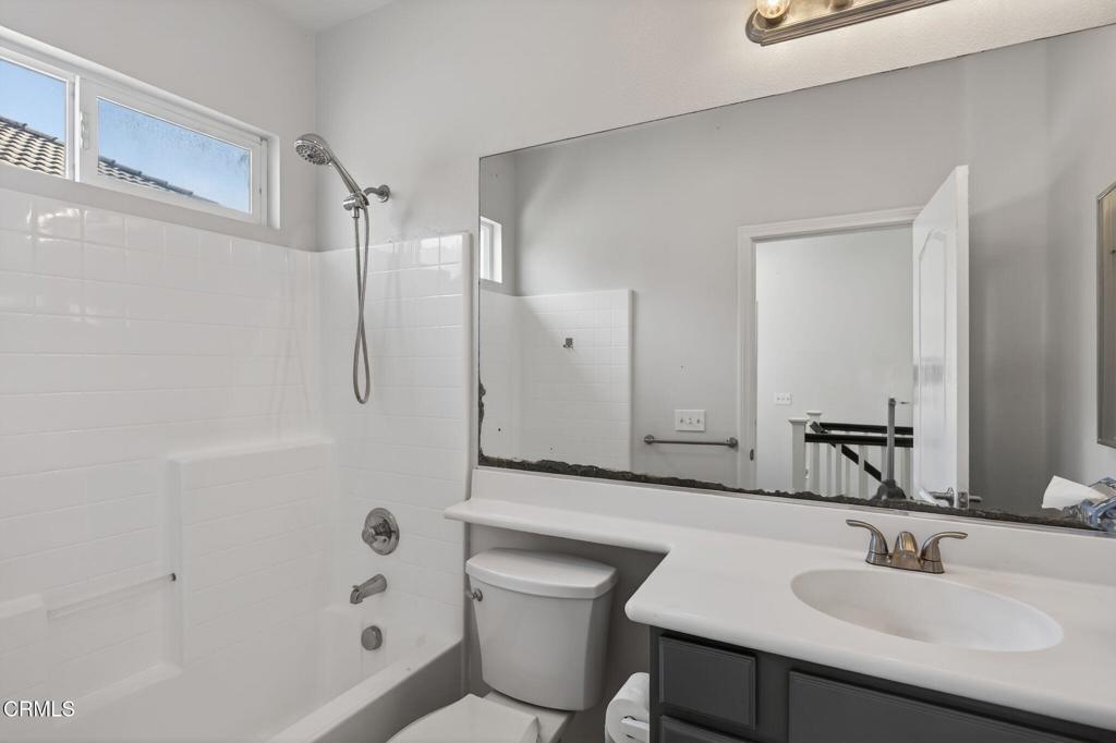 5331 Davidson Drive Oxnard, CA 93033 - Photo 17 of 38 a bathroom with a sink toilet and shower