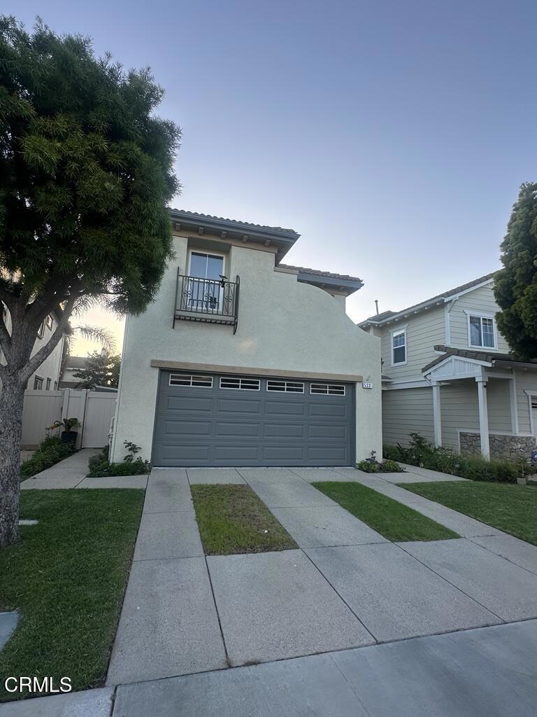 5331 Davidson Drive Oxnard, CA 93033 - Photo 4 of 38 a view of a house with a yard