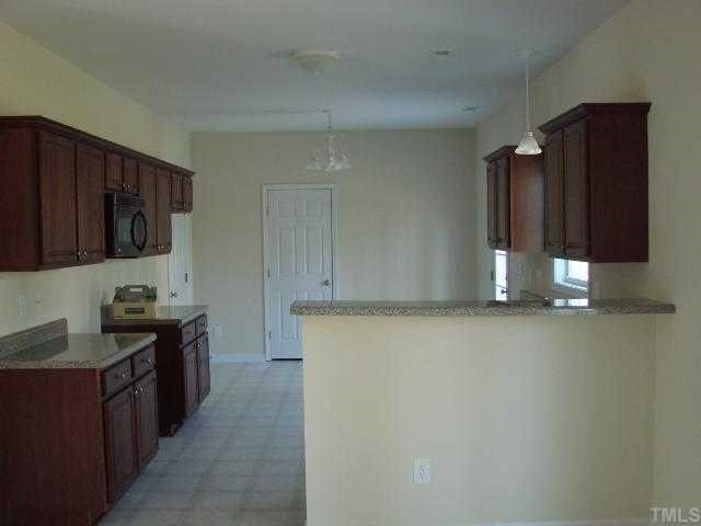 2804 Varnish Place Raleigh, NC 27610 - Photo 3 of 10 Beautiful designer kitchen with lots of cabinets and counter space!
