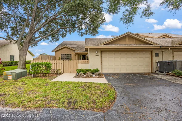 $305,000 | 1311 Island Green Drive Northeast, Unit B212, Palm Bay, FL 32905
