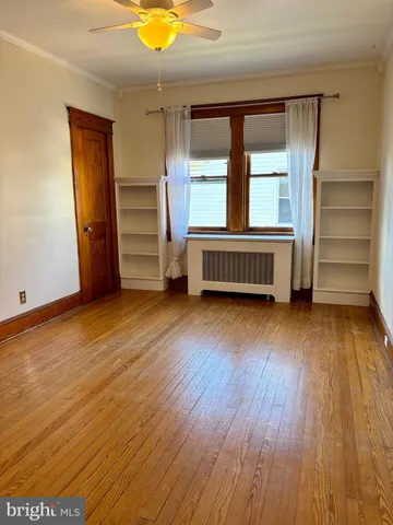 wooden floor and windows in an empty room