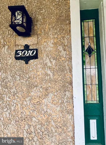 a view of an entryway with a door