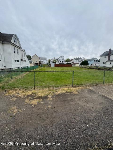 20 Cook Street Ashley, PA 18706 - Photo 5 of 6 a view of a street with a big yard