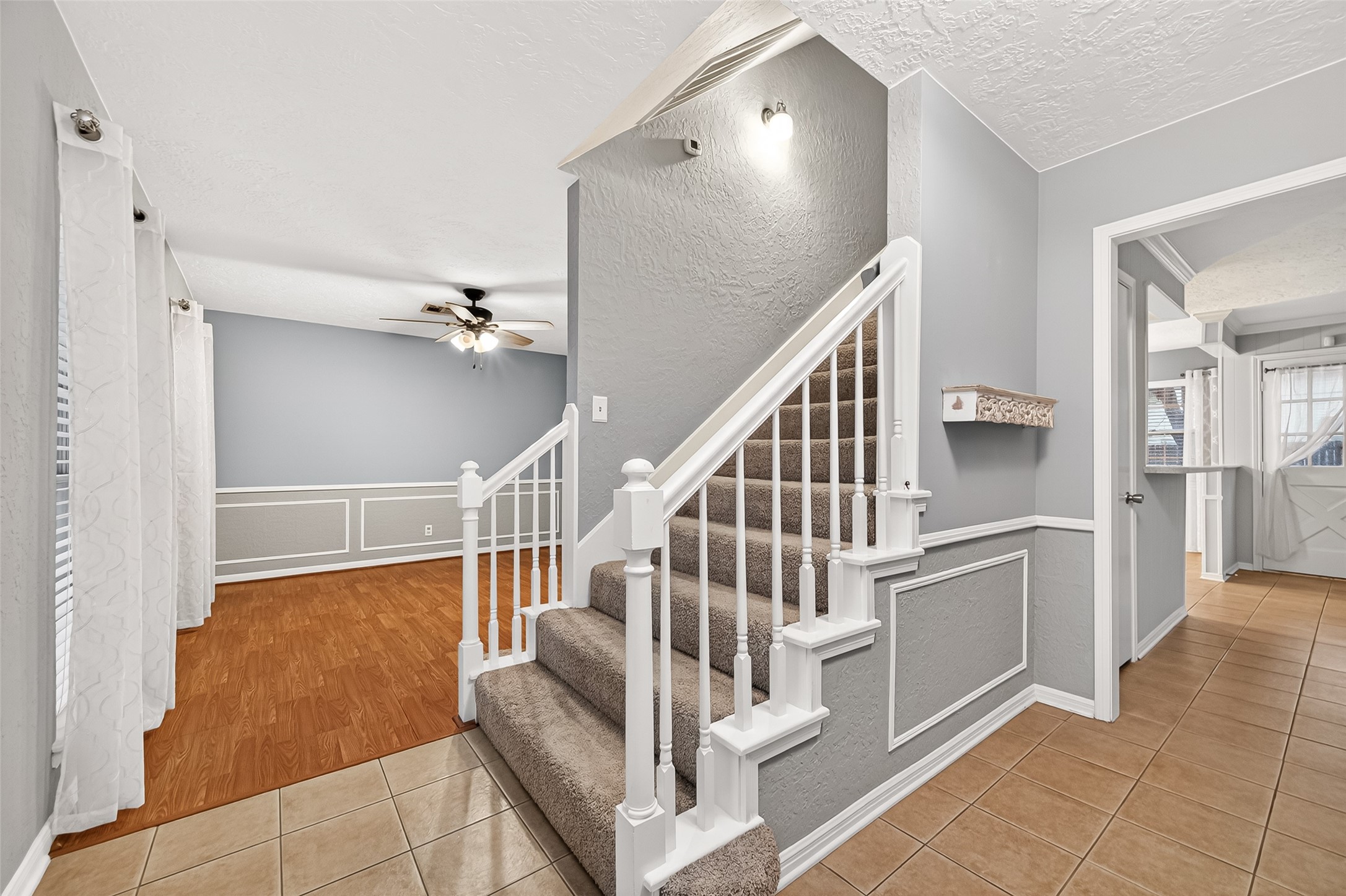 17810 Abby Lane Spring, TX 77379 - Photo 5 of 50 Nice Wide Staircase looking into Formal Dining Room