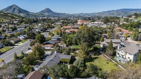 an aerial view of residential house with an outdoor space