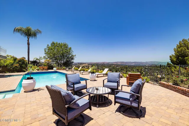 a view of a terrace with furniture