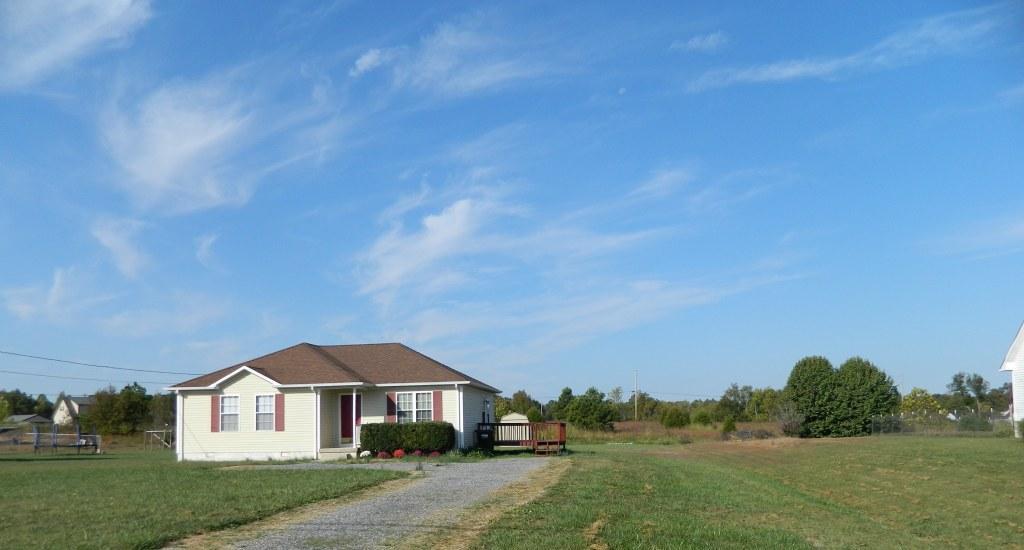 111 Miranda Road Cadiz, KY 42211 - Photo 1 of 15 a house view with a garden space