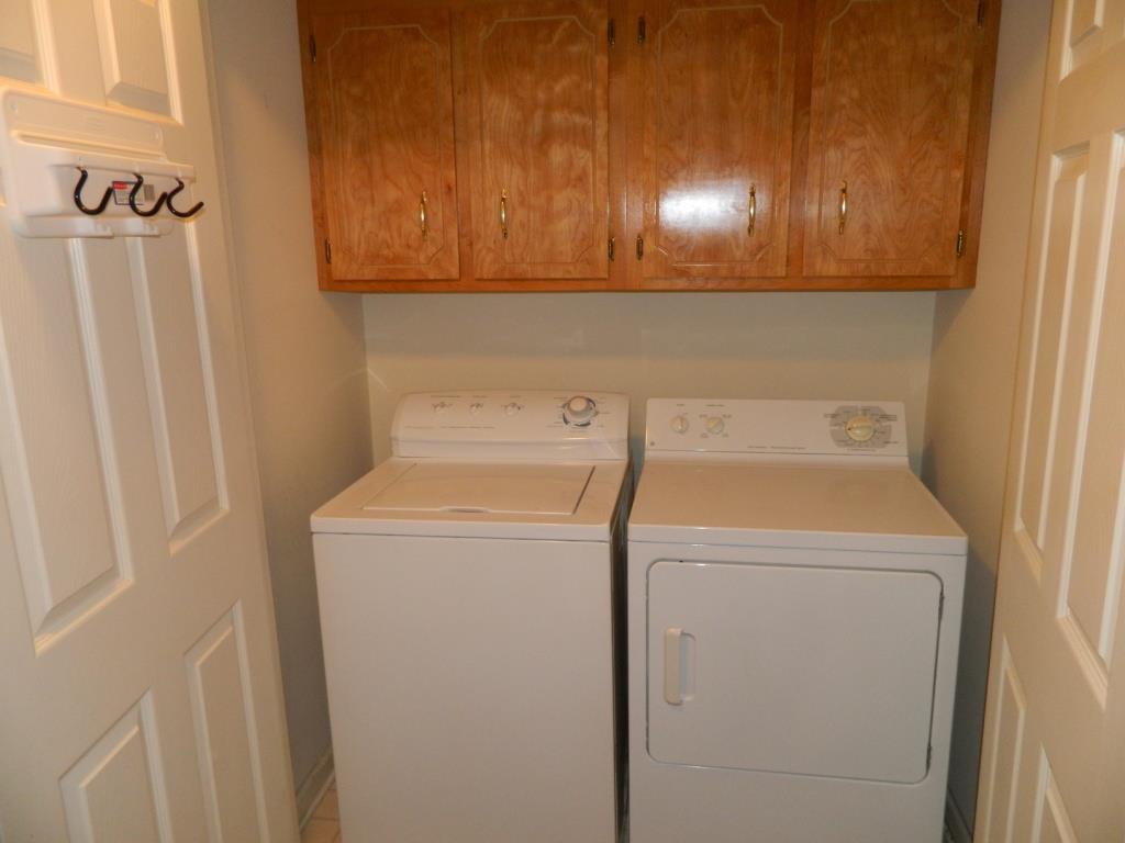 111 Miranda Road Cadiz, KY 42211 - Photo 13 of 15 a utility room with dryer and washer