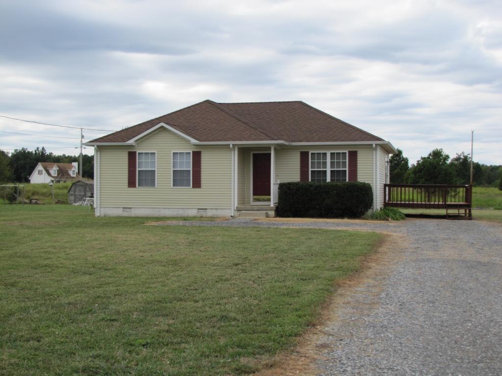 111 Miranda Road Cadiz, KY 42211 - Photo 15 of 15 a front view of a house with a garden