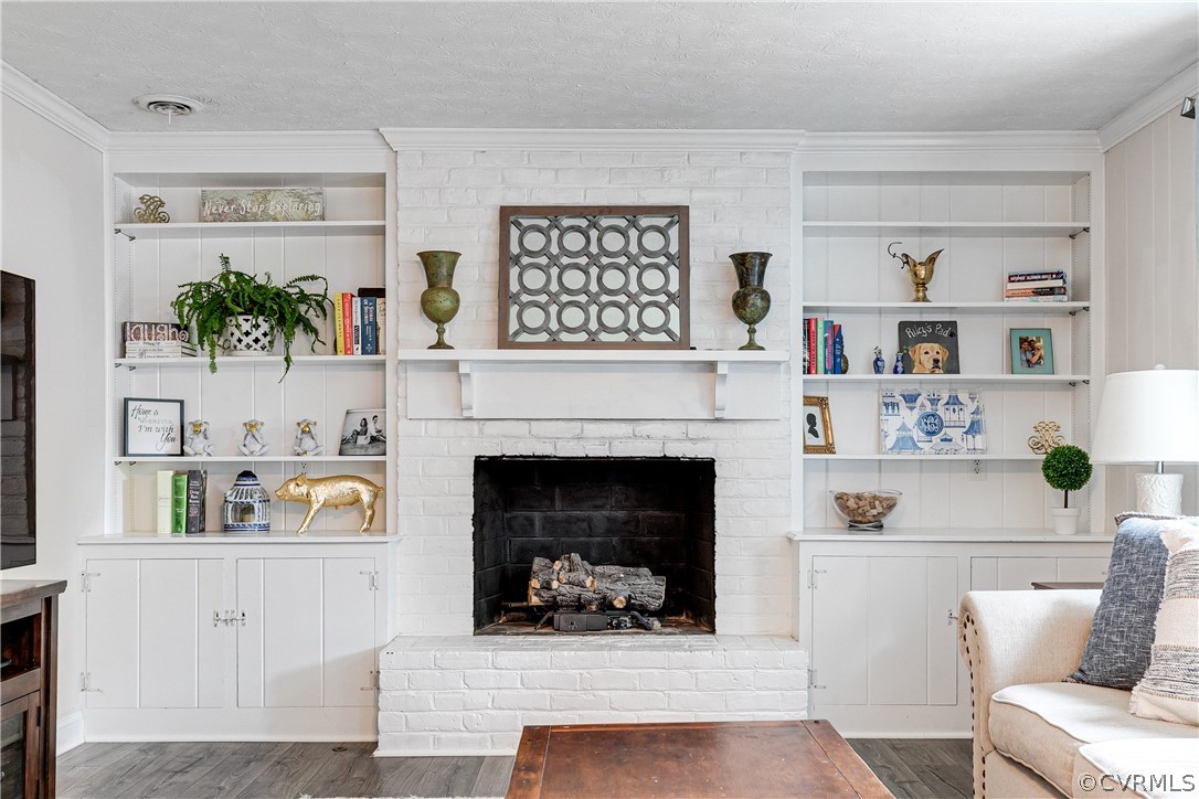 1313 Foster Road Richmond, VA 23226 - Photo 16 of 26 Beautiful custom built ins flank a gas fireplace
