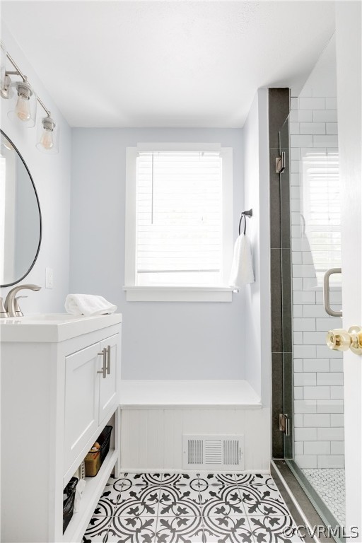 1313 Foster Road Richmond, VA 23226 - Photo 22 of 26 Cute new floor, subway tile and glass shower door