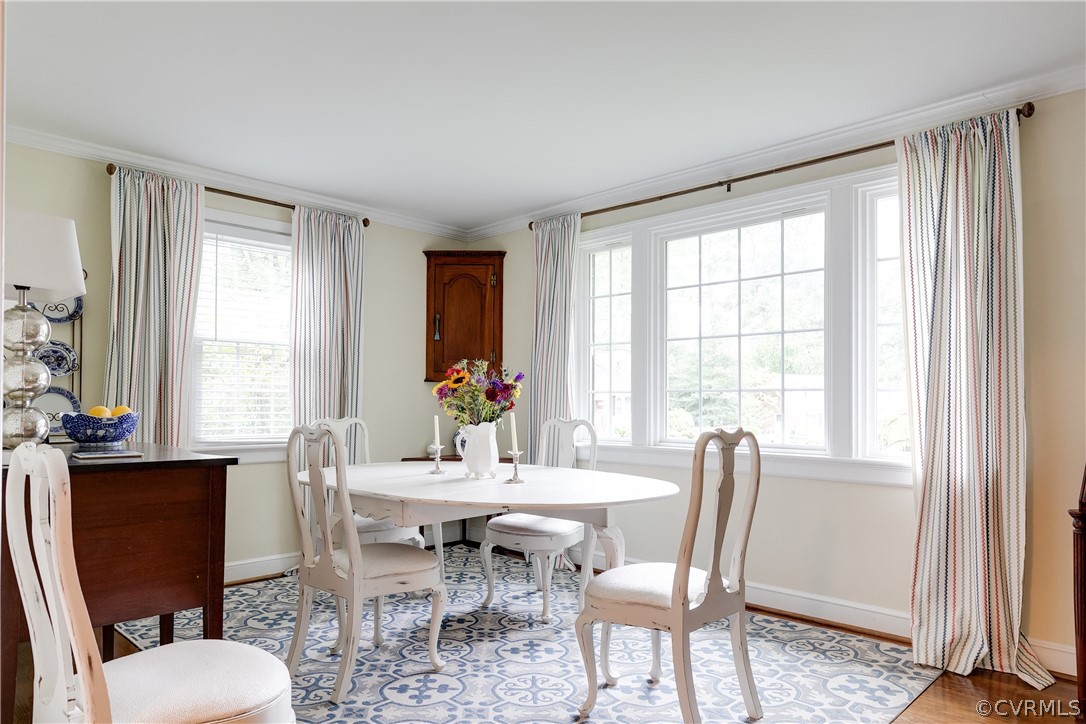 Big picture window fills the room with natural log