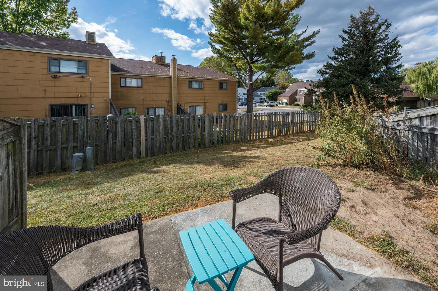 56 Dover Drive Lindenwold, NJ 08021 - Photo 13 of 13 a view of a chair and table in backyard