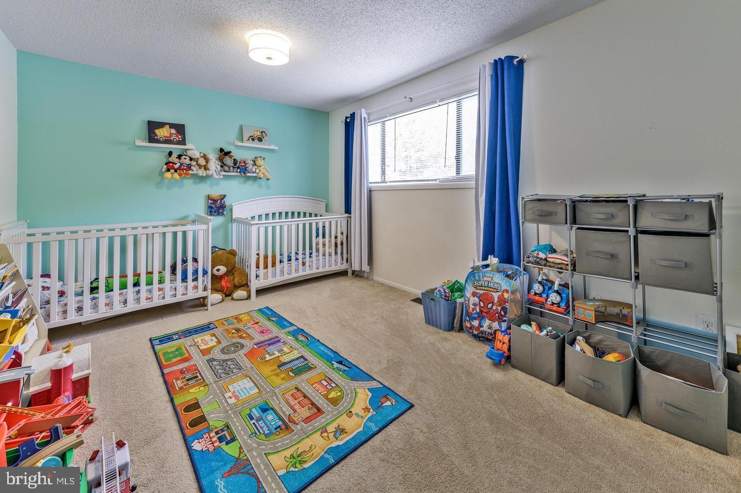 56 Dover Drive Lindenwold, NJ 08021 - Photo 9 of 13 a bedroom with furniture and a window