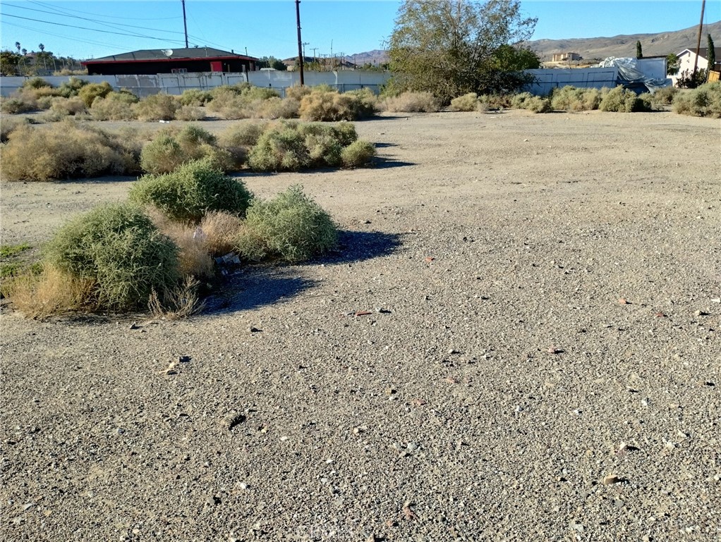 1613 Riverside Drive Barstow, CA 92311 - Photo 5 of 14 a view of a dry yard