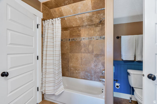 1355 West 1000 South Mapleton, UT 84664 - Photo 44 of 74 Bathroom featuring toilet and shower / bath combination with curtain
