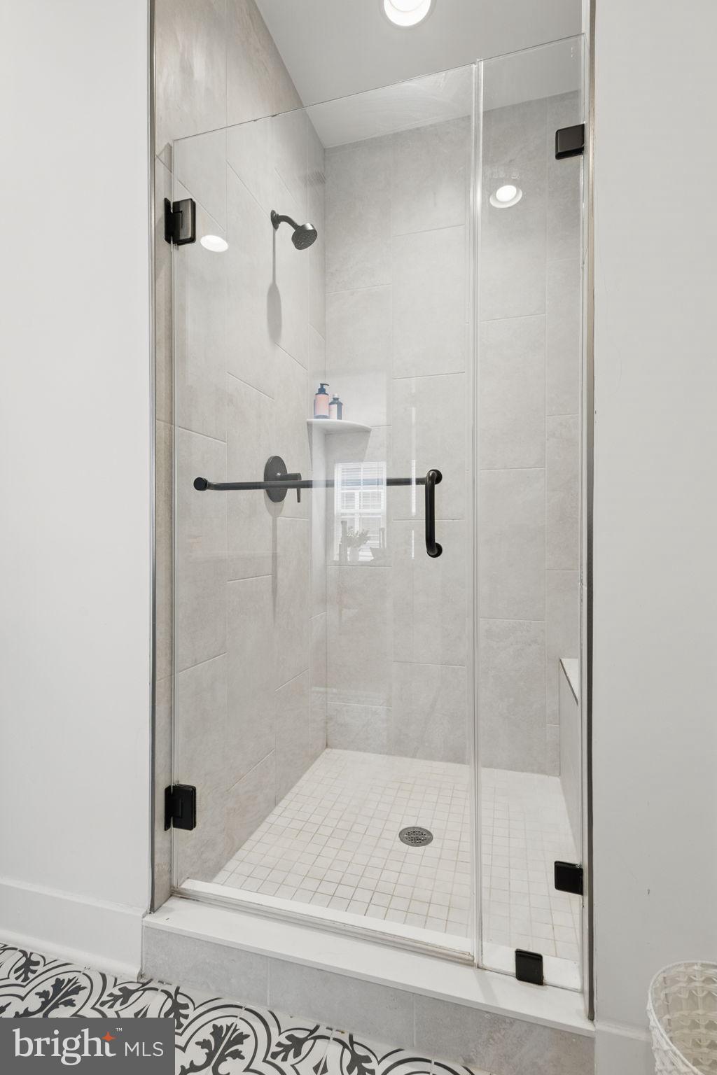 11239 Beaker Street Reston, VA 20190 - Photo 11 of 22 a bathroom with a shower