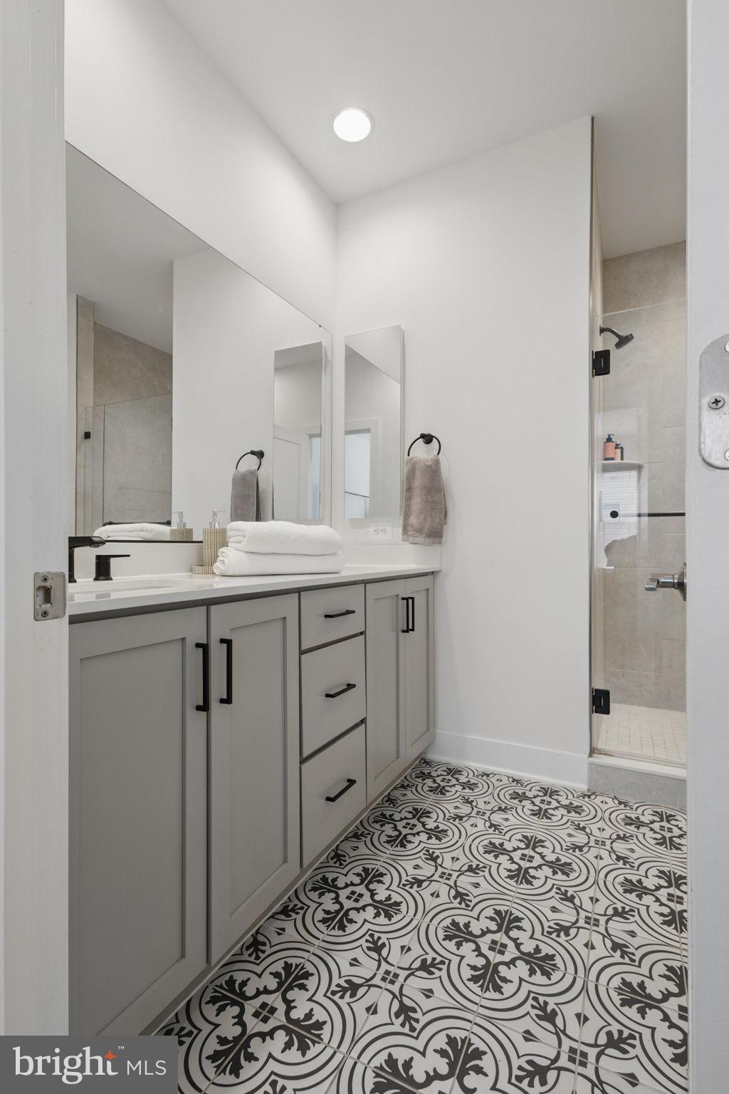 11239 Beaker Street Reston, VA 20190 - Photo 12 of 22 a kitchen with a sink and cabinets