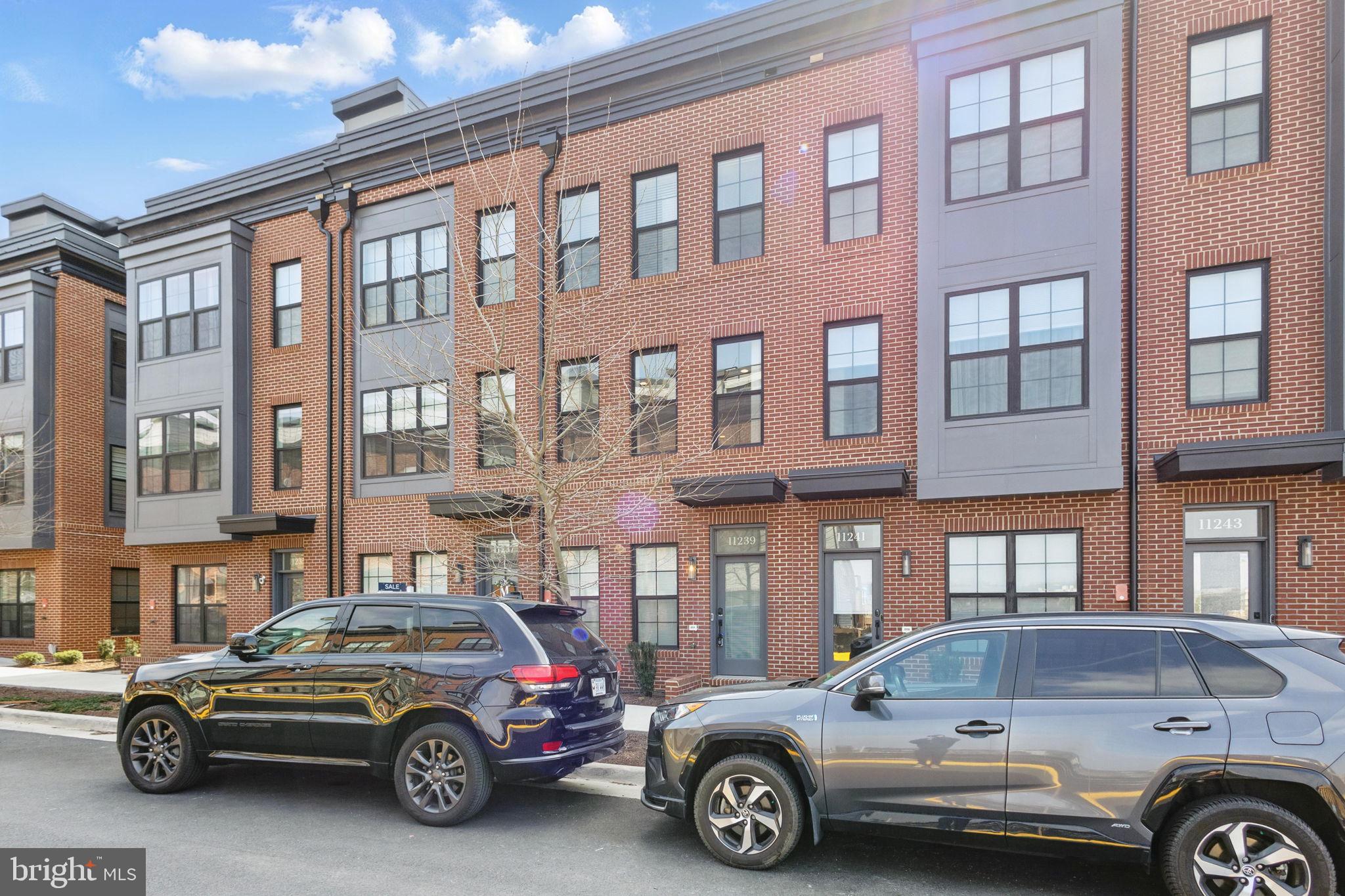 11239 Beaker Street Reston, VA 20190 - Photo 22 of 22 a car parked in front of a building