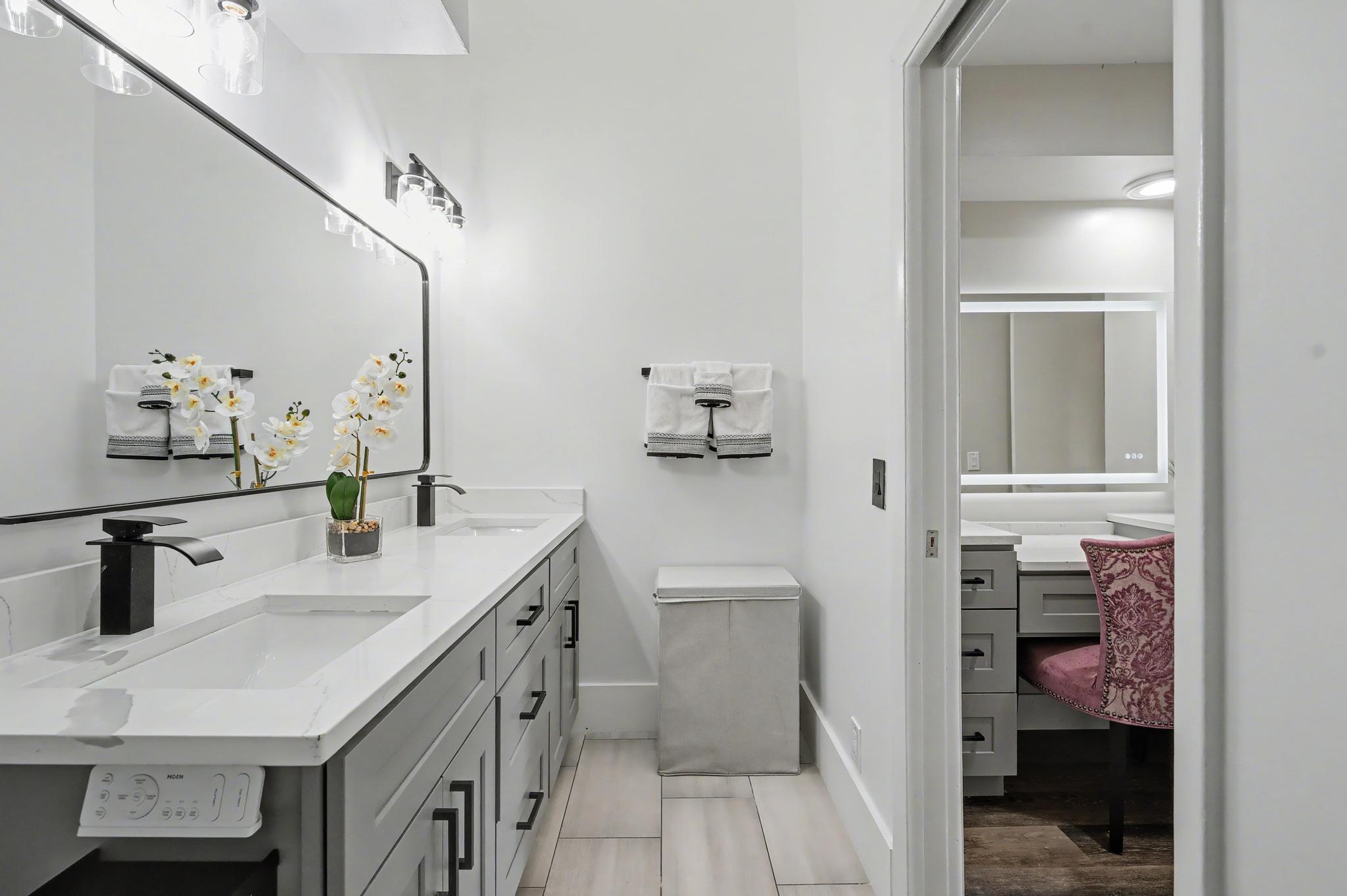 7855 Stanway Place Boca Raton, FL 33433 - Photo 15 of 25 a bathroom with a sink and a mirror