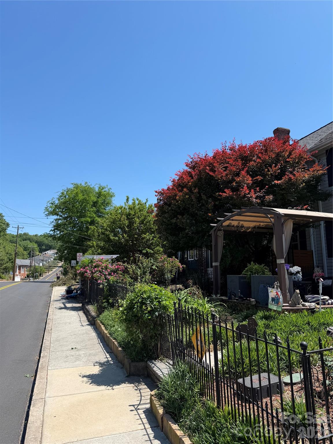 85 Falls Road Badin, NC 28009 - Photo 13 of 13 a view of a street with cars parked on the street side