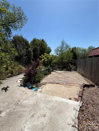 a view of backyard with outdoor space