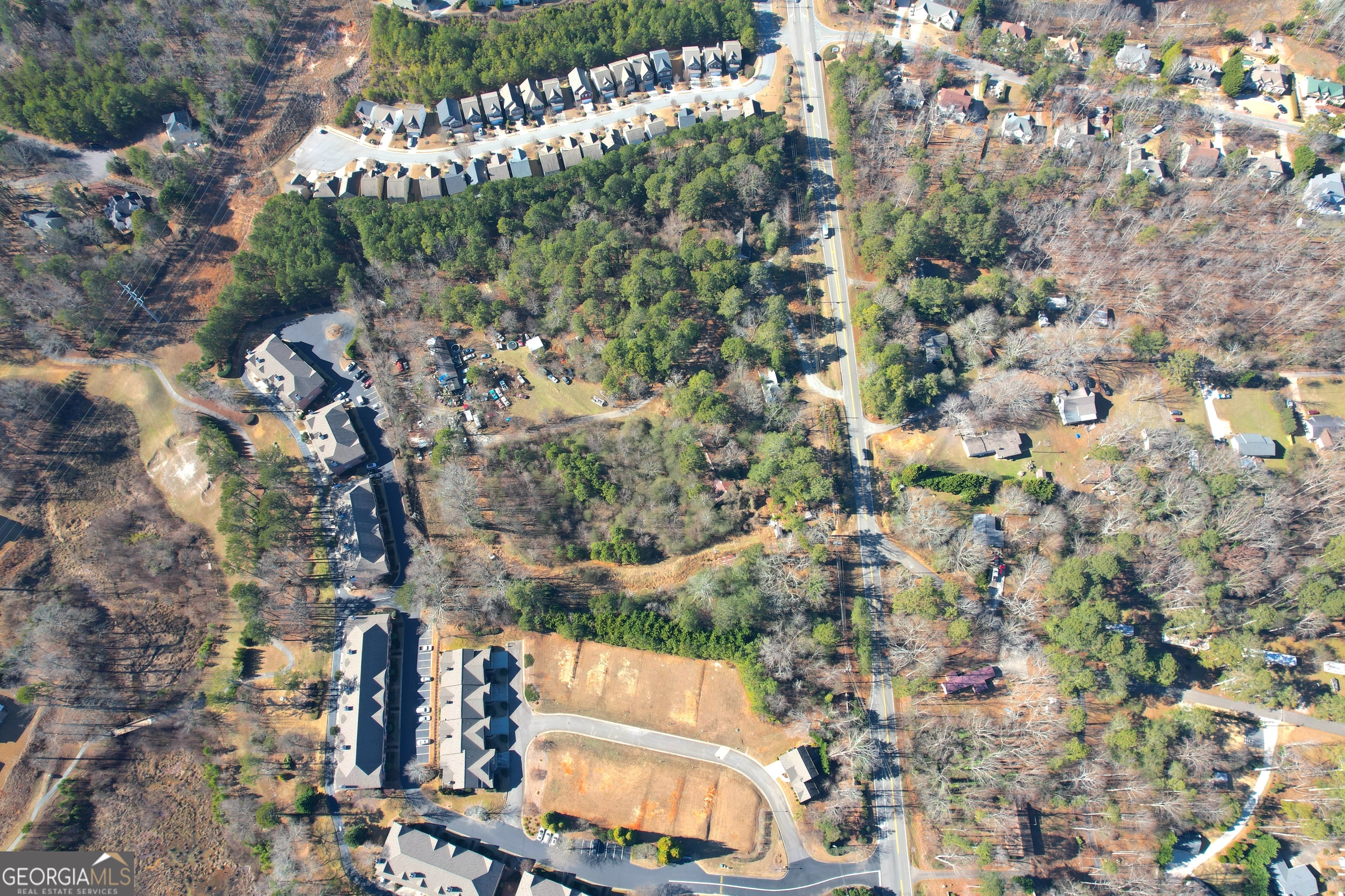 1740 Buford Dam Road Cumming, GA 30041 - Photo 5 of 17 an aerial view of residential houses with outdoor space