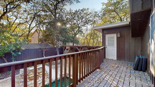 a view of a yard with furniture and a tree
