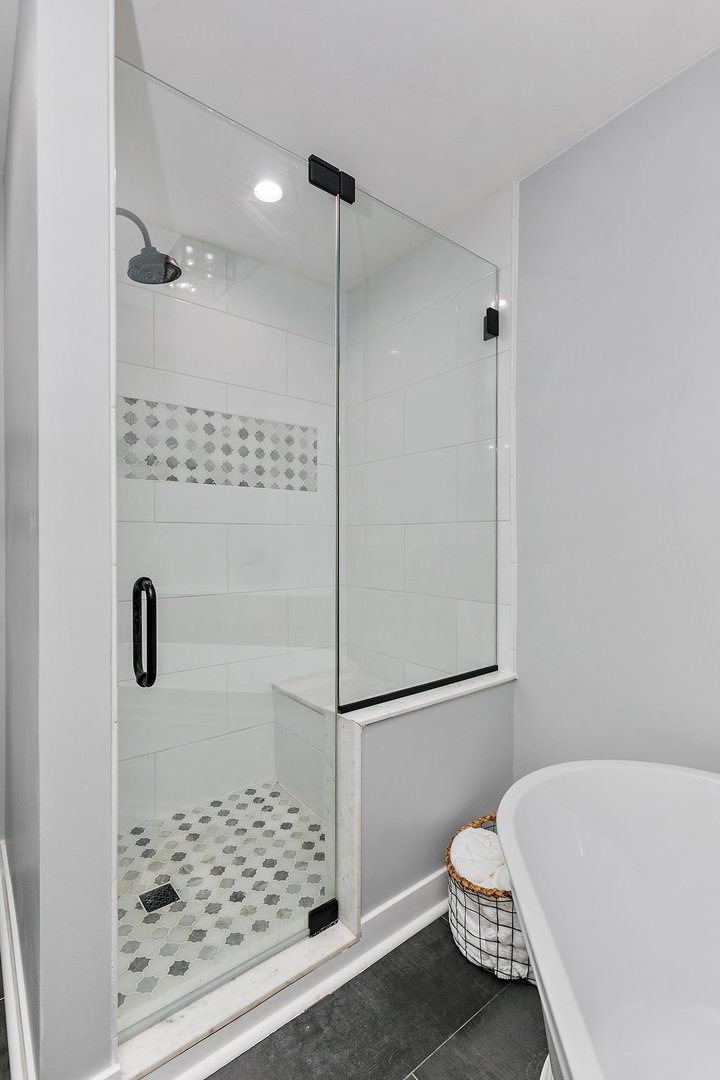 1037 North Harrison Street Algonquin, IL 60102 - Photo 16 of 46 a bathroom with a bathtub and shower