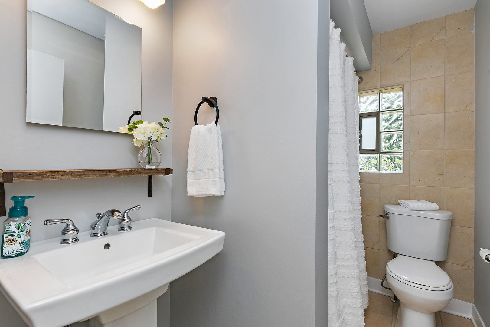 1037 North Harrison Street Algonquin, IL 60102 - Photo 19 of 46 a bathroom with a toilet sink and mirror