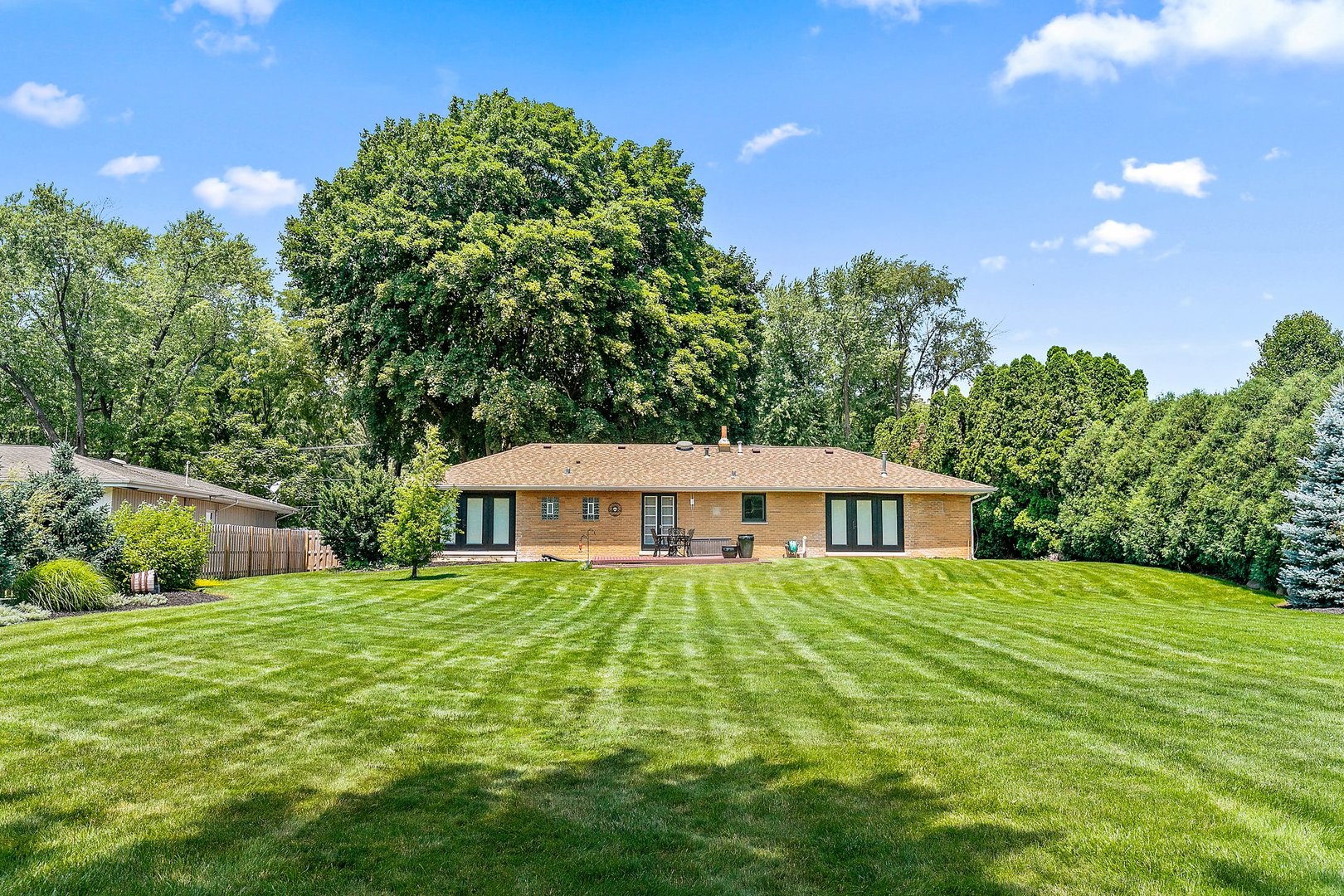 1037 North Harrison Street Algonquin, IL 60102 - Photo 31 of 46 a view of a house with a yard