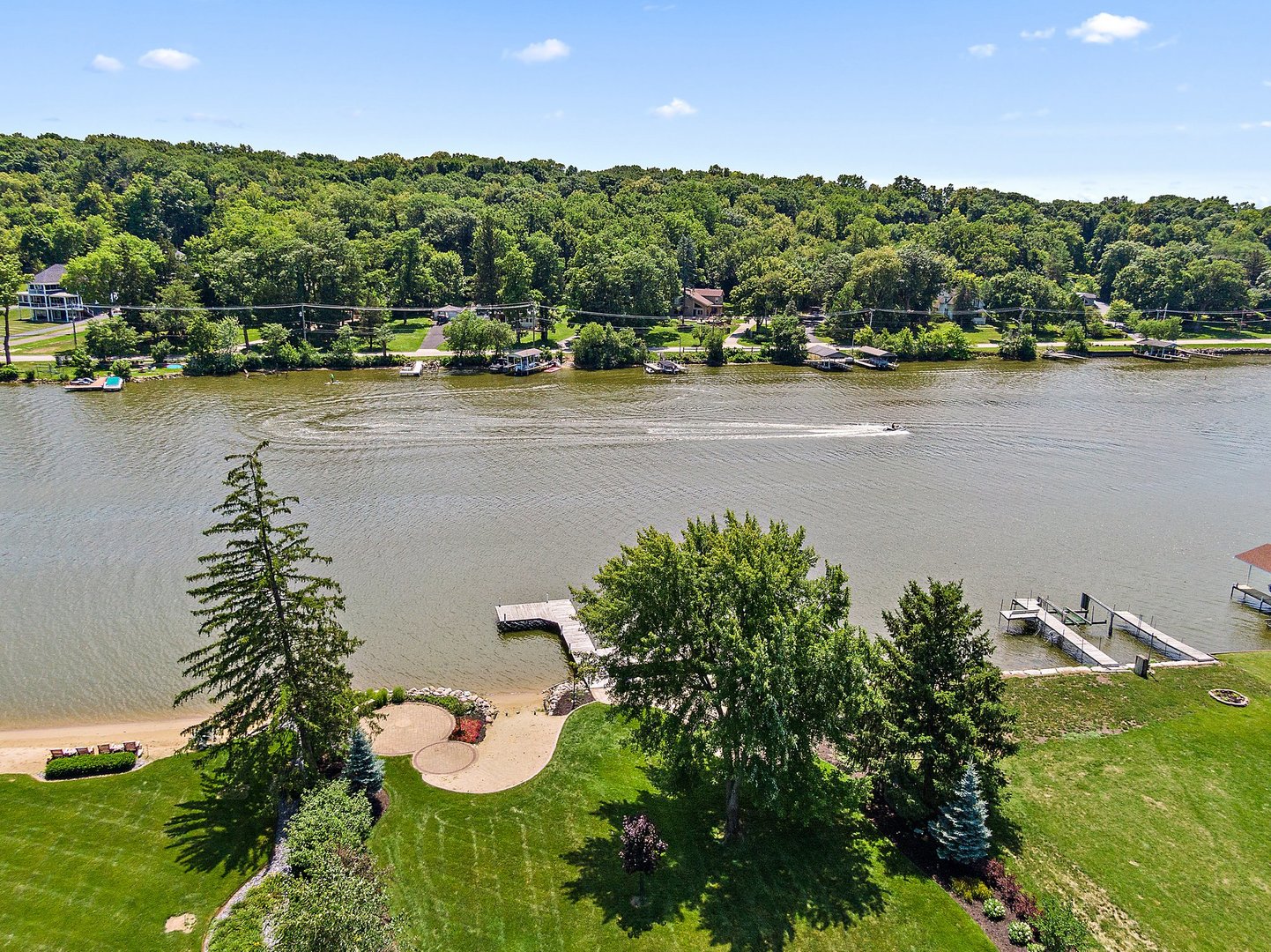 1037 North Harrison Street Algonquin, IL 60102 - Photo 32 of 46 an aerial view of a house with a yard and lake view