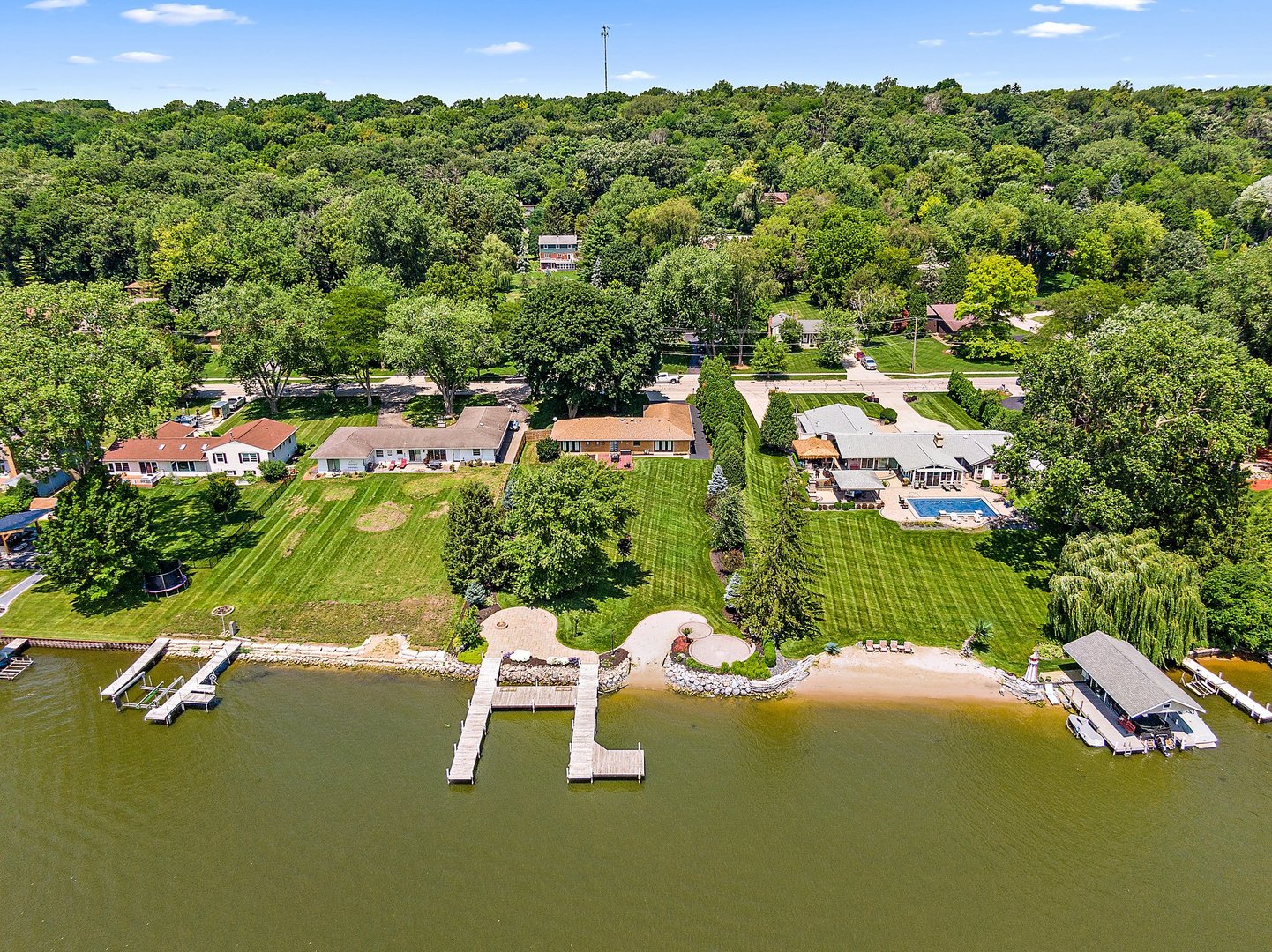 1037 North Harrison Street Algonquin, IL 60102 - Photo 40 of 46 a view of a swimming pool with a yard